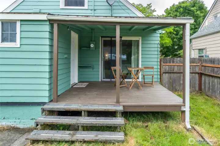 Back sitting porch off main bedroom.