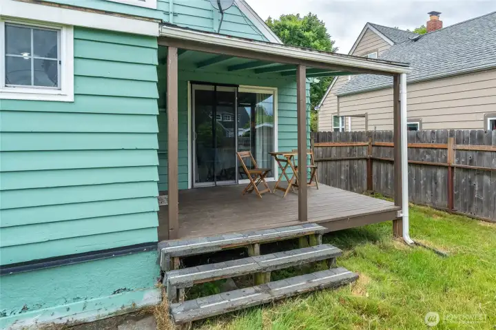 Back sitting porch off main bedroom.