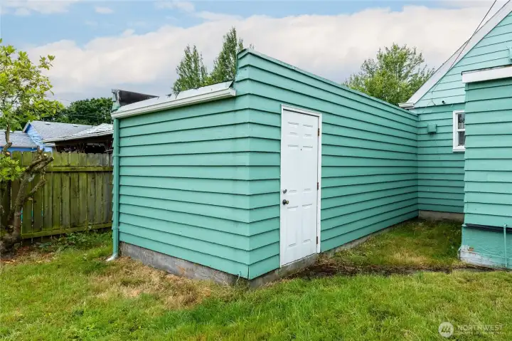 Attached garage with outside entrance.