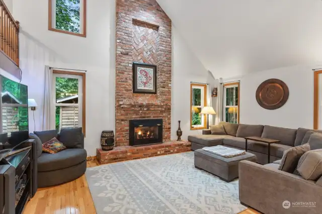 Towering brick fireplace and mantle
