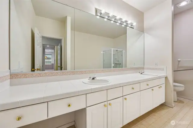 Primary bathroom with dual sinks.