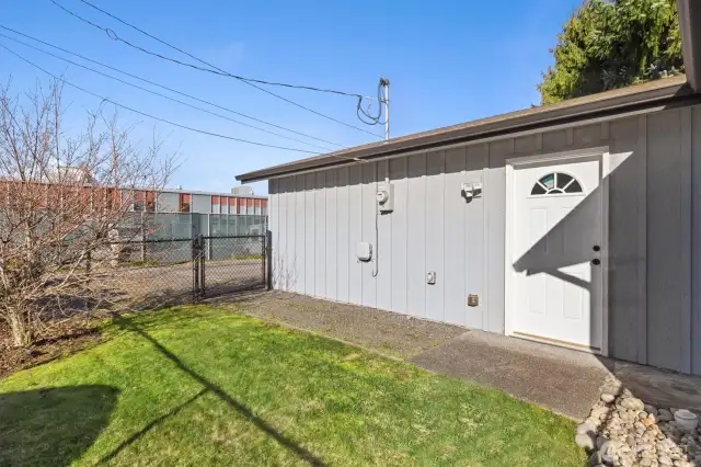 Fully fenced side yard.