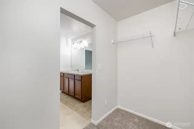 Large walk in closet with plenty of storage