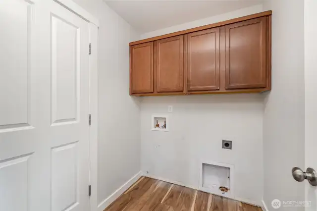 Laundry room with storage
