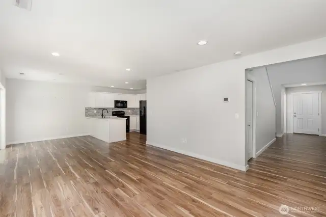 This perspective highlights the seamless flow of the main floor living space, offering an open and inviting layout.
