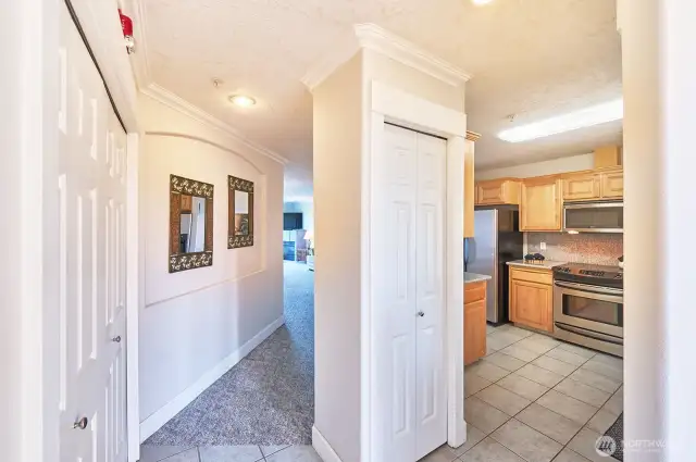 Kitchen to right, hallway to great room ahead