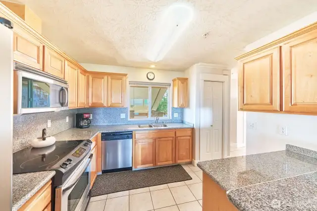 Looking east from dining area to the kitchen