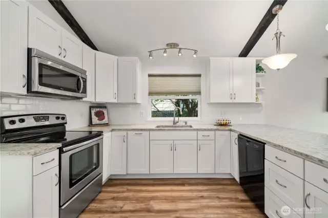 Quartz counters, stainless steel appliances.