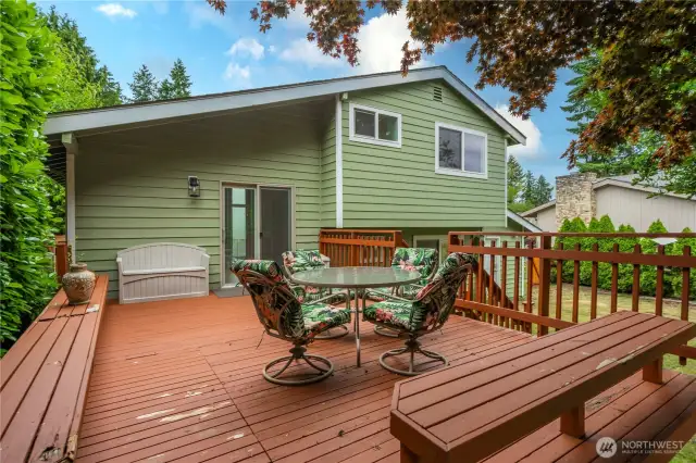 Pleasing deck with mature landscaping