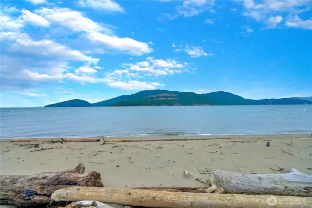There is one beach access co-owned by Potlach neighbors with stairs, and another public access point here just down the road.  Not marked on road, either one, but you'll get the info!
