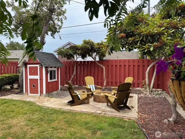 Hang out with friends on the back patio and enjoy fruit from your very own fruit trees