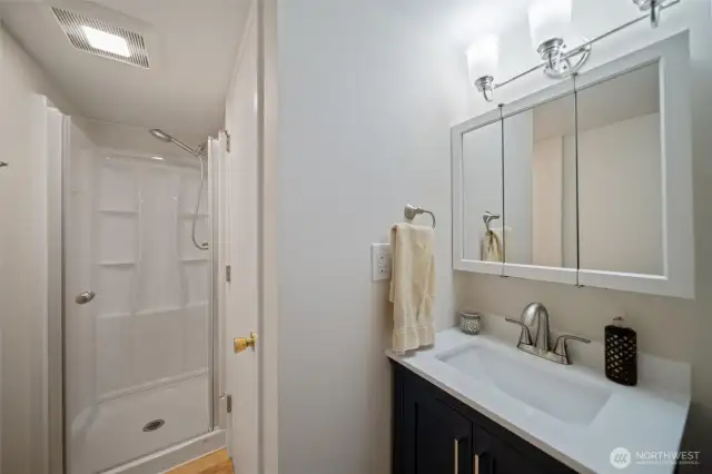 Bathrooms on both levels of home. This one is located upstairs.