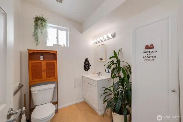 Bathroom next to office space