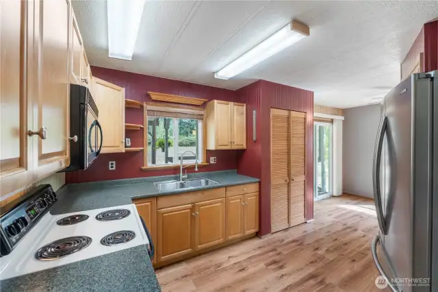 Updated kitchen has two pantries! Never run out of storage space.