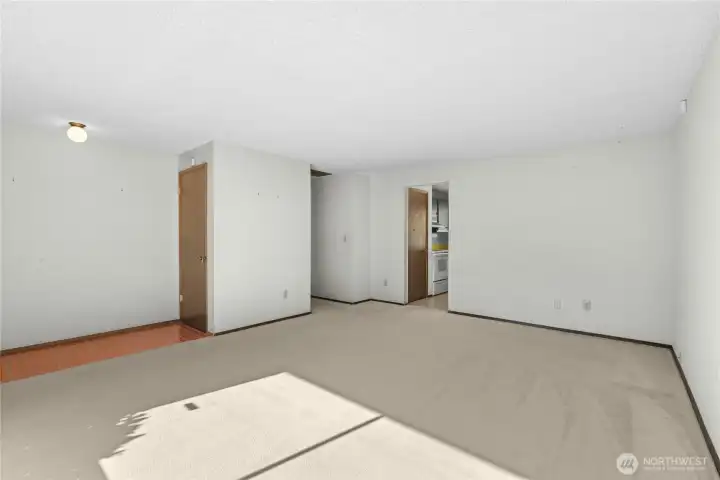 Living room doorway leads to kitchen