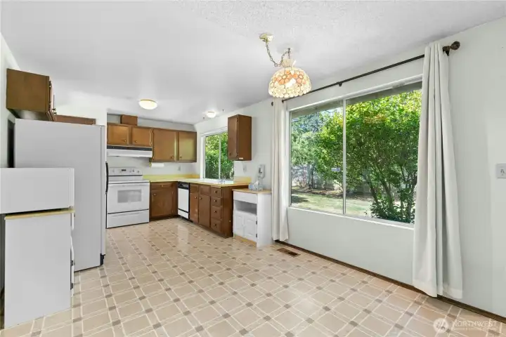 Kitchen windows allow for natural light to enter home