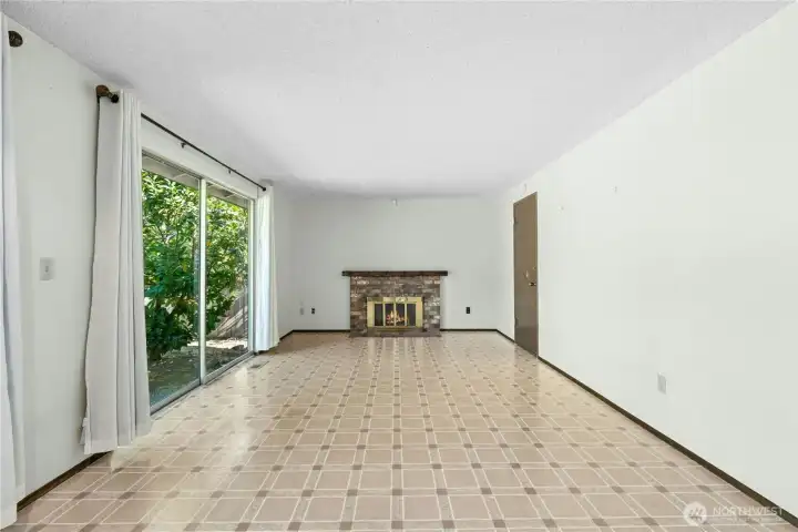 Spacious family room flows from kitchen