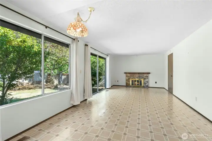 Family room with fireplace and slider for more natural light and access to backyard