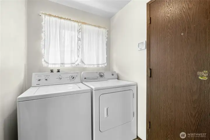 Laundry room leads to 2 car attached garage