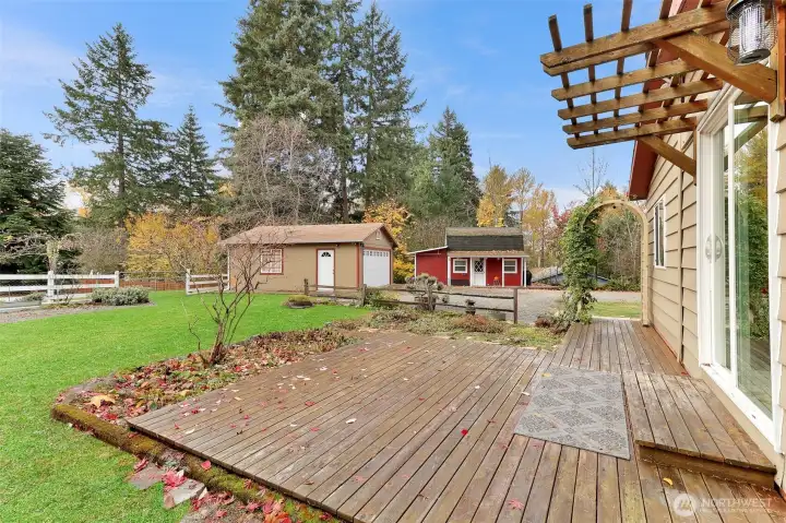 View from back deck of the pasture, garage and detached studio.