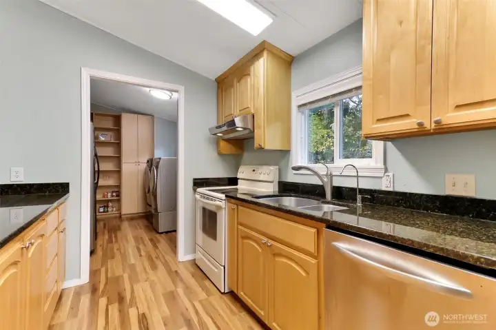 Beautiful granite counters, updated cabinets and an instant cold water dispenser.