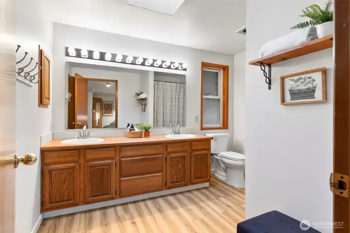 Upper primary bathroom with storage closet