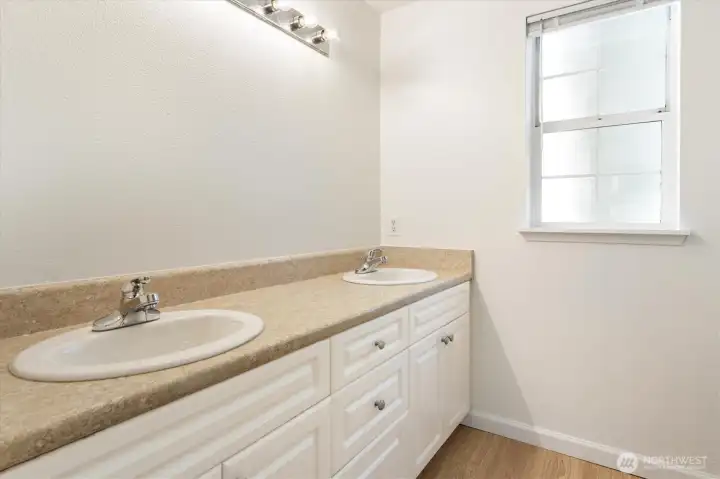 Dual sinks are one highlight of the primary bathroom.