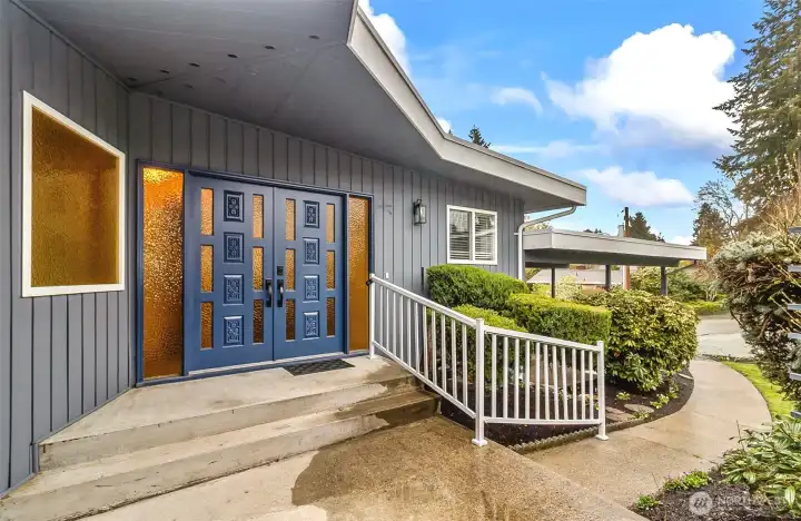 Make A Statement Before You Even Step Inside. Striking Double Doors, Warm Accent Glass and Clean Architecture.