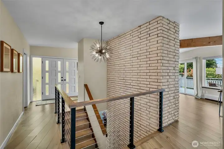 Mid-Century Clean Lines, A Bold Stair Rail And Oversized Windows Bring In Natural Light From Every Angle.