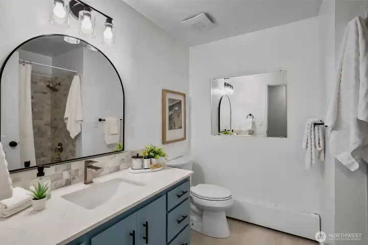 This Full Guest Bathroom Shines.