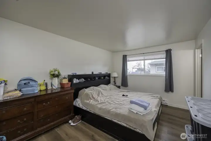 Unit 208 Primary Bedroom + Ensuite Bath