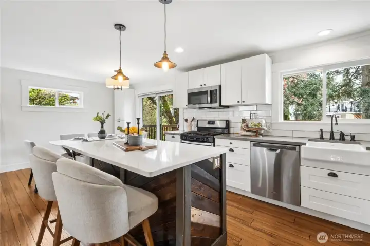 Sliding glass door opens to large Trex deck for BBQ or dining al fresco!