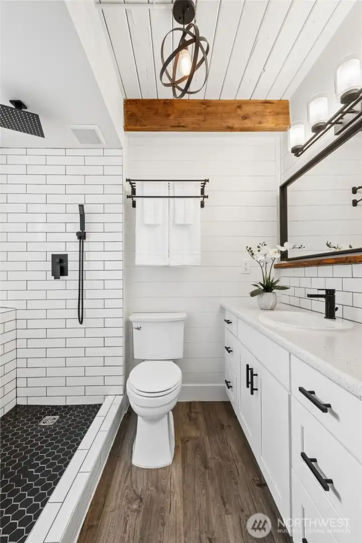 Recently remodeled lower level bath.