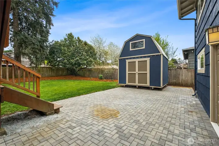 Large shed for tools, gear, gardening supplies, and more.