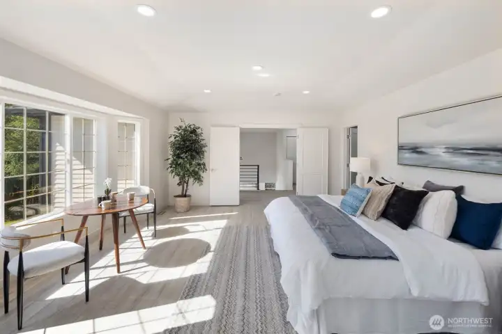 Expansive primary suite w/views. Expansive primary suite w/views.