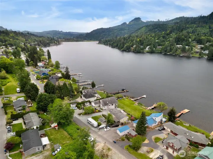 Home is to the left of the blue roofed home. Plenty of parking for your large RV and Boat!