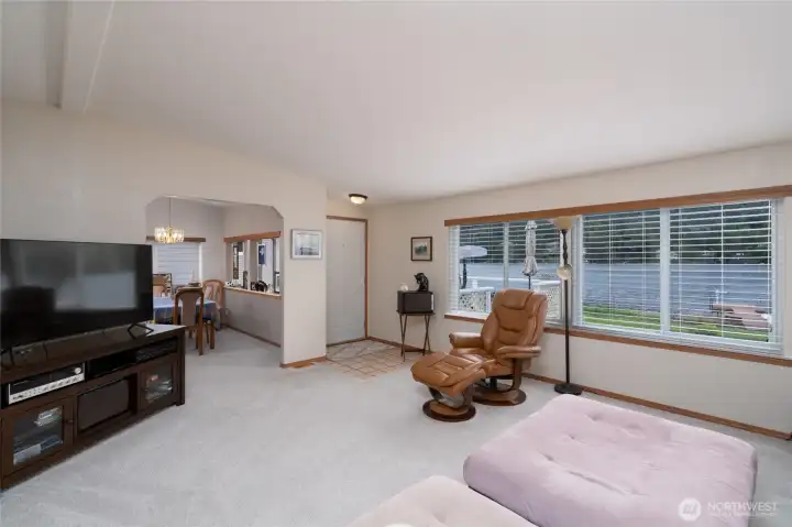 Living room with view of Big Lake! Door leads right to the deck.