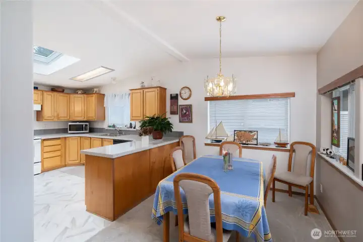 Dining room has view of the lake and is super convenient to the kitchen!