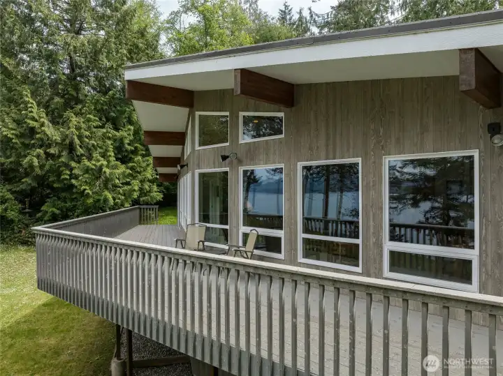 Deck spans the entire waterfront side of the house.