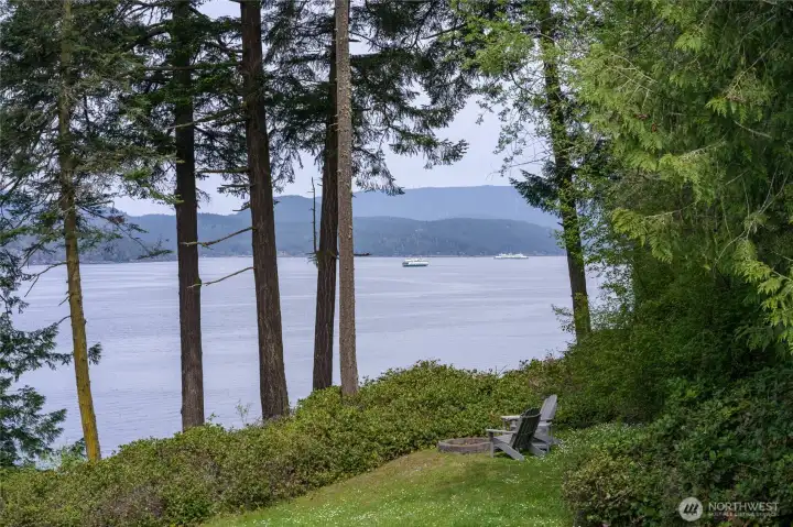 Out the door, down the deck and over to the firepit to watch the ferries pass by.