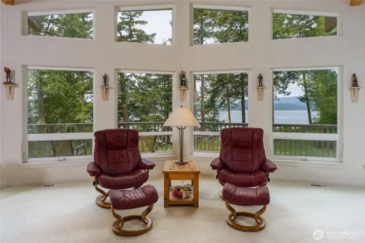 Two chairs in the Great Room frame the view.