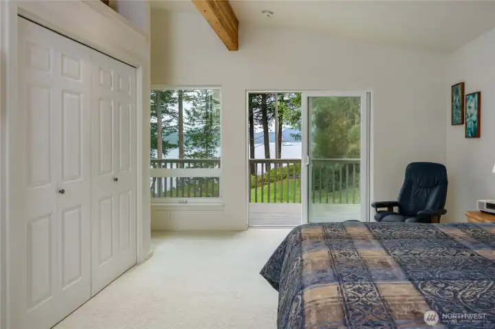 Sliding door to the deck from the primary bedroom.