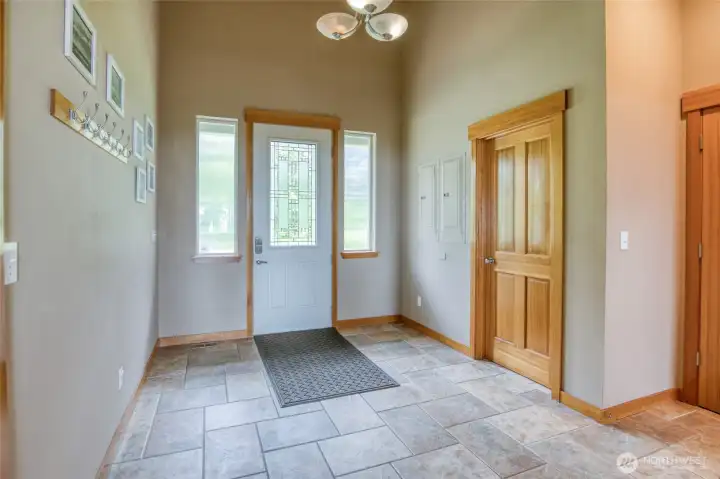 The gracious entry is spacious and offers storage and access to the upper and lower level suites.