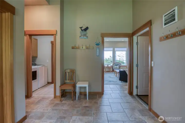 The utility can be shared with the upper and lower units but this property can easily be used as a single family residence.  The laundry has a 3/4 bath perfect for accesses the back yard and hot tub.