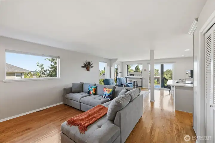 The property features hardwood flooring, new windows, and a stunning view.
