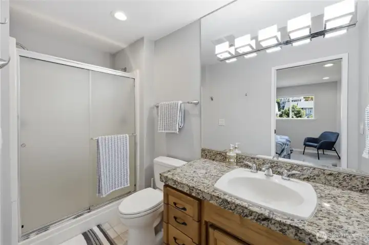 Modern light, granite countertops.