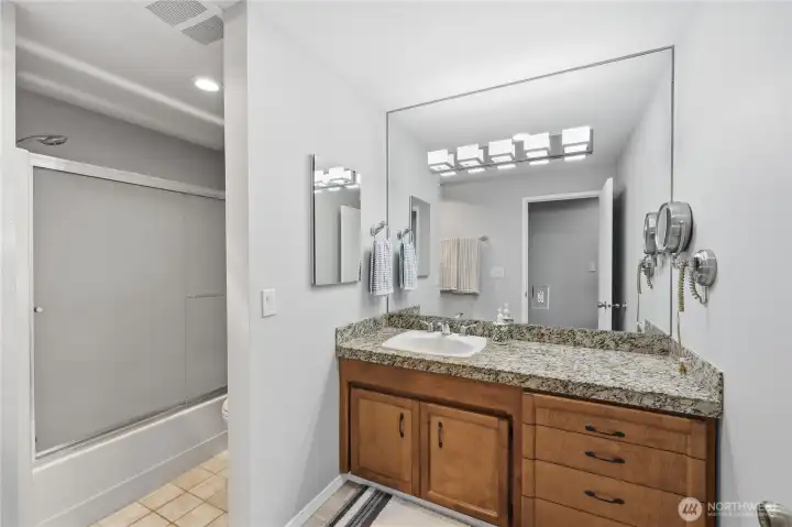 Bathroom off of the hallway.  Granite countertops.