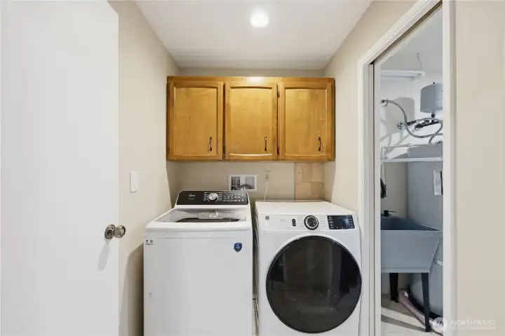 Laundry area with utility sink.
