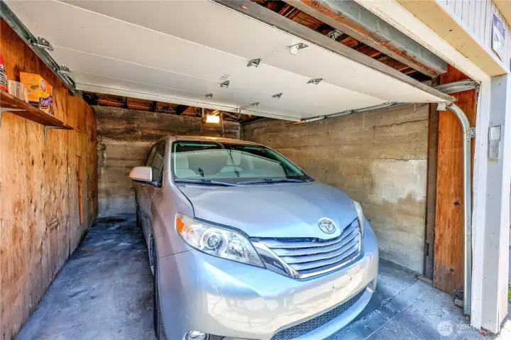 Garage showing the capacity for a minivan or large suv.