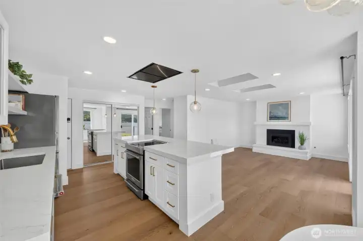 View of kitchen from Dining area. Kitchen aid Induction stove View of kitchen from Dining area. Kitchen aid Induction stove